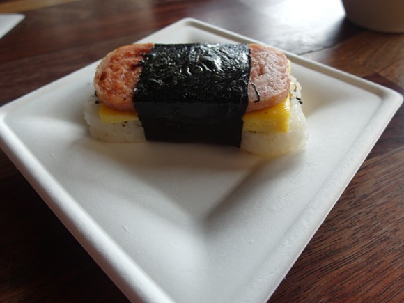 The musubi, pictured here, can be found in diners, shops, and underground hole-in-the-walls all over the islands. - By Serena Maria Daniels.
