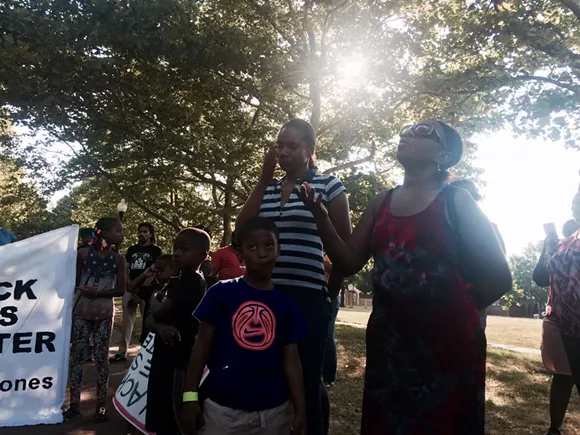 Aiyana Stanley-Jones's grandmother Mertilla Jones (right), godmother/cousin Charlotte Givens (left) and little brother.