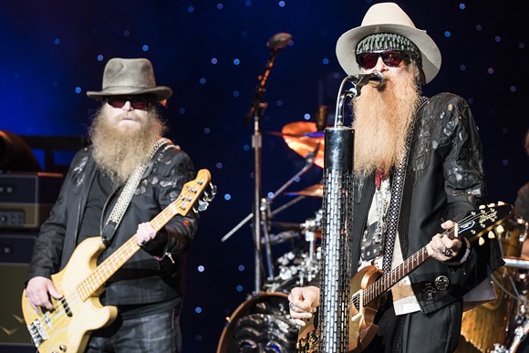Dusty Hill, left, and Billy Gibbons of ZZ Top at DTE Energy Music Theatre on Wednesday. - PHOTO BY MIKE FERDINANDE