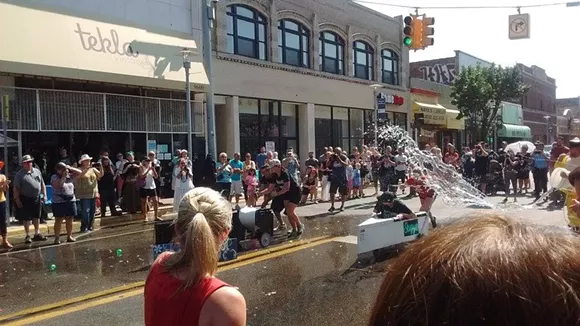 Buckets of water are allowed too. - Photos by Michael Jackman