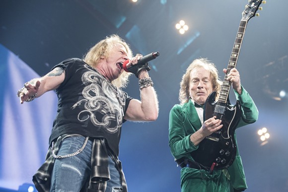 Axl Rose and Angus Young onstage at The Palace of Auburn Hills on Friday. - Photo by Mike Ferdinande