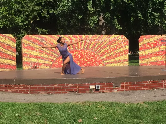 The Detroit-Windsor Dance Academy's Amber Moore performs "Crowned" during an Open Streets event at Clark Park on Tuesday. - Photo by Jennifer McDonnell.