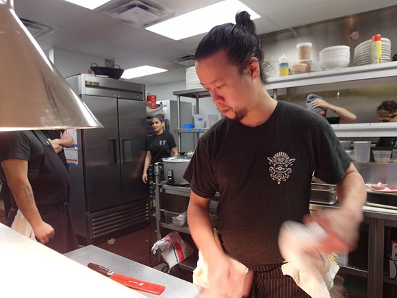 The Peterboro's chef de cuisine Brion Wong in the kitchen. - PHOTO BY SERENA MARIA DANIELS