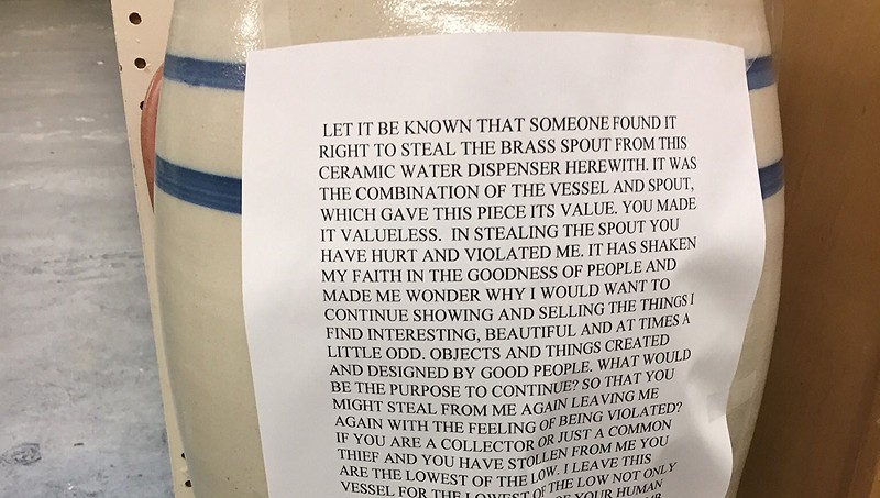 The note a Michigan antique store owner put on this ceramic jug is the darkest, bleakest thing we've read all week