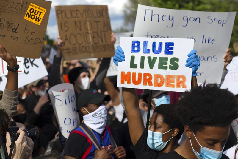Protesters in Detroit rally against police brutality. - STEVE NEAVLING