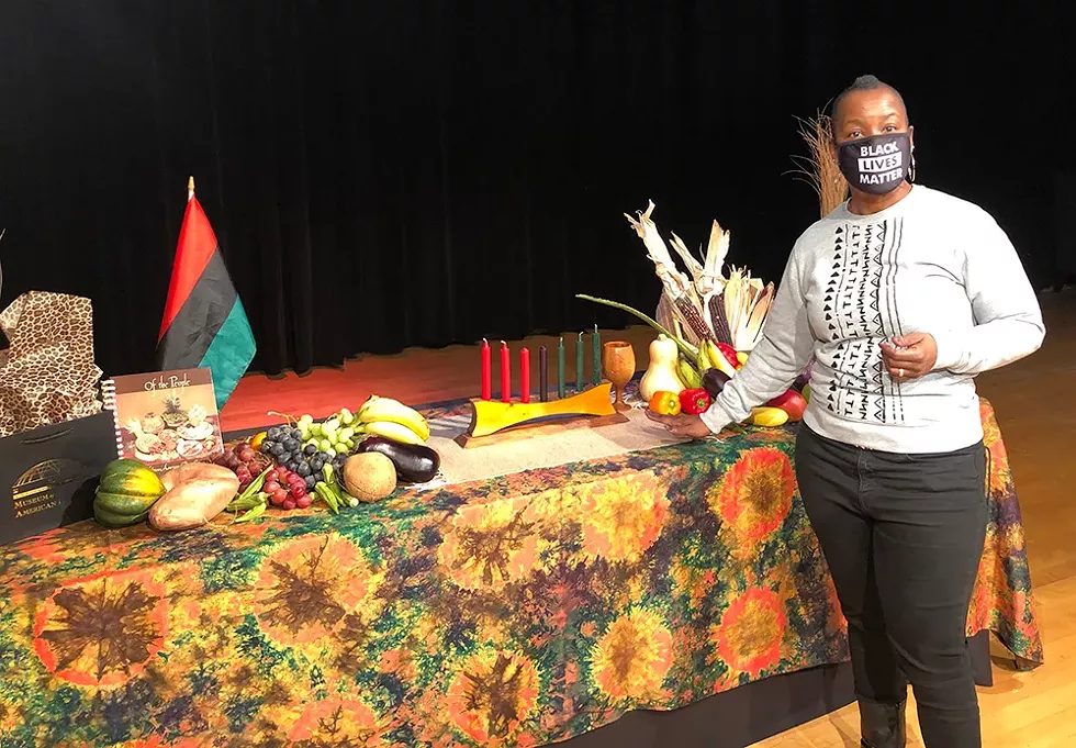 "I want the energy and the excitement and enthusiasm about Kwanzaa to infect everybody," Yolanda Jack of the Charles H. Wright Museum of African American History says. "Because I believe that everybody can benefit from it." - Lee DeVito