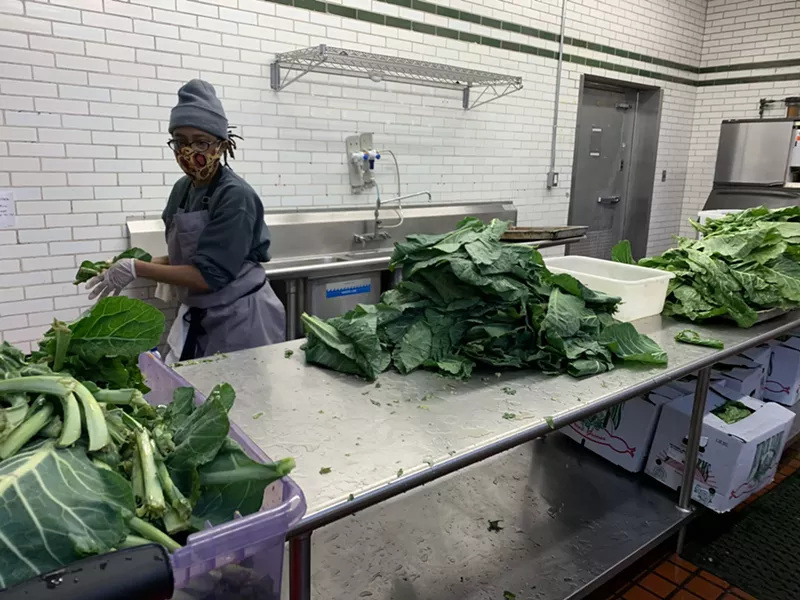 Chef Le’Genevieve Squires prepares holiday meals  at Marygrove College. - Make Food Not Waste