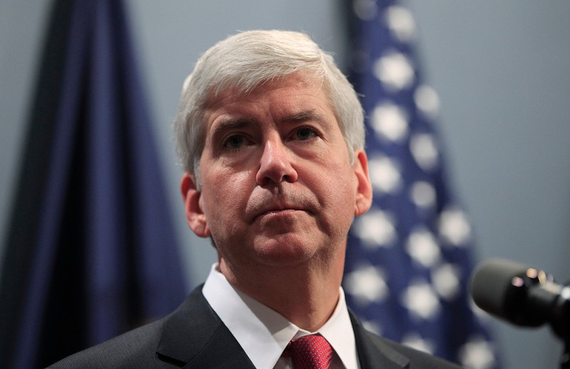 Former Michigan Governor Rick Snyder faces charges of willful neglect in the Flint water crisis. - VASILIS ASVESTAS / SHUTTERSTOCK.COM