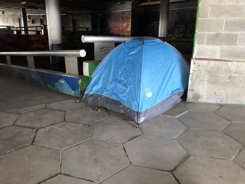 A tent in the underground part of Detroit's Hart Plaza. - Lee DeVito
