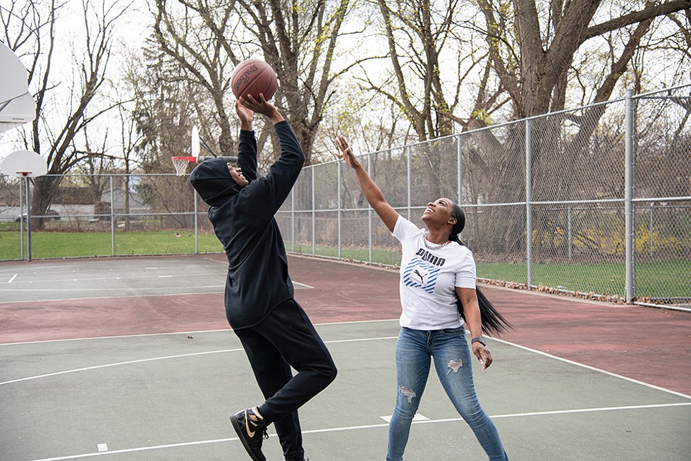 Dominica Sims-Sharda plays basketball with her son. - Cydni Elledge
