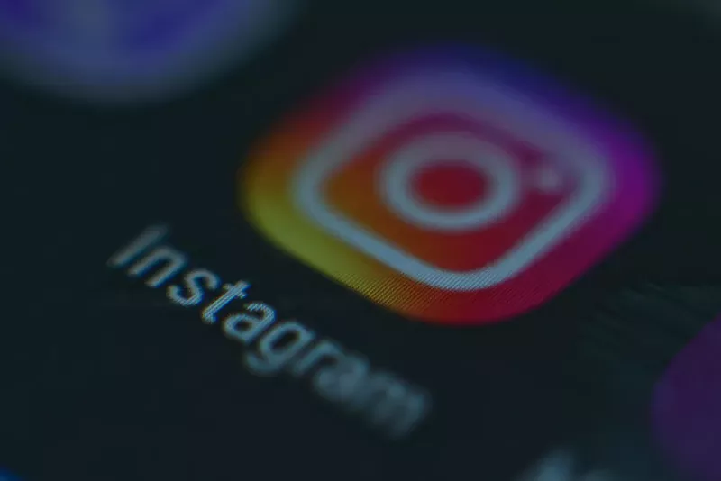 A photo of a monitor or a tablet or phone screen with the Instagram icon. - sub job / Shutterstock.com