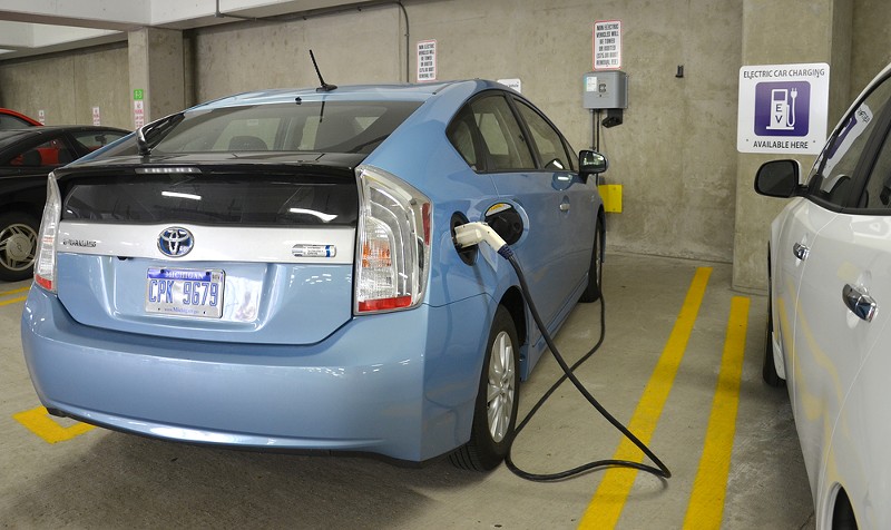 A car being charged at one of the 18 electric vehicle chargers in Ann Arbor on June 21, 2013. The federally funded chargers have delivered over 10,000 kilowatt hours. - SUSAN MONTGOMERY / SHUTTERSTOCK.COM