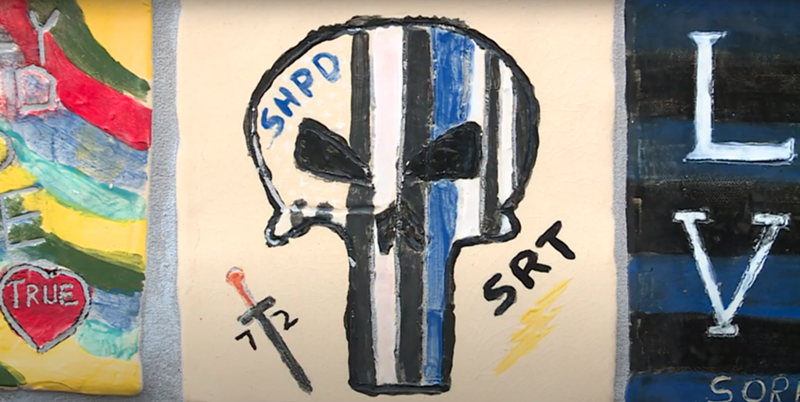 A tile featuring the controversial 'Punisher' logo, which has become co-opted by white supremacy and hate groups. - Screengrab, City of Sterling Heights YouTube