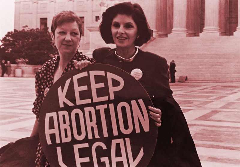 Norma McCorvey (Jane Roe) and her lawyer Gloria Allred on the steps of the Supreme Court, 1989. - Lorie Shaull