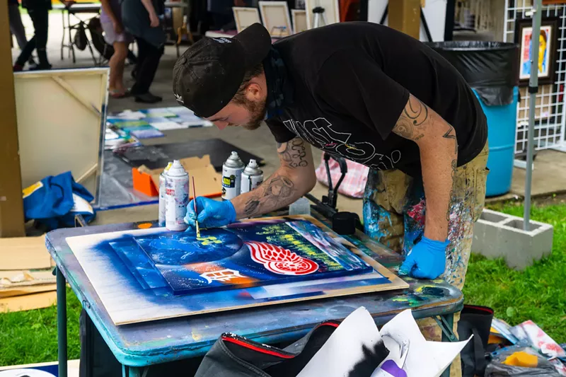 Artists gotta art at the Hazel Park Art Fair. - Photo by Greg Aubury