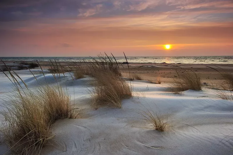 A sunrise along Lake Huron in Michigan. - Shutterstock