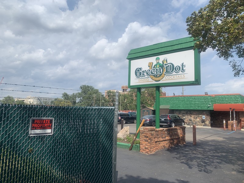 Last week, the Detroit International Bridge Co. erected a metal fence through Green Dot Stables’ parking lot after it discovered it owned part of the property. - JERILYN JORDAN