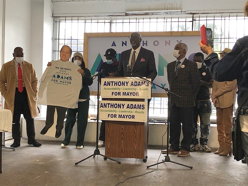 Detroit mayoral candidate Anthony Adams brings out a cardboard cutout of Mayor Mike Duggan, who has refused to debate him. - Lee DeVito