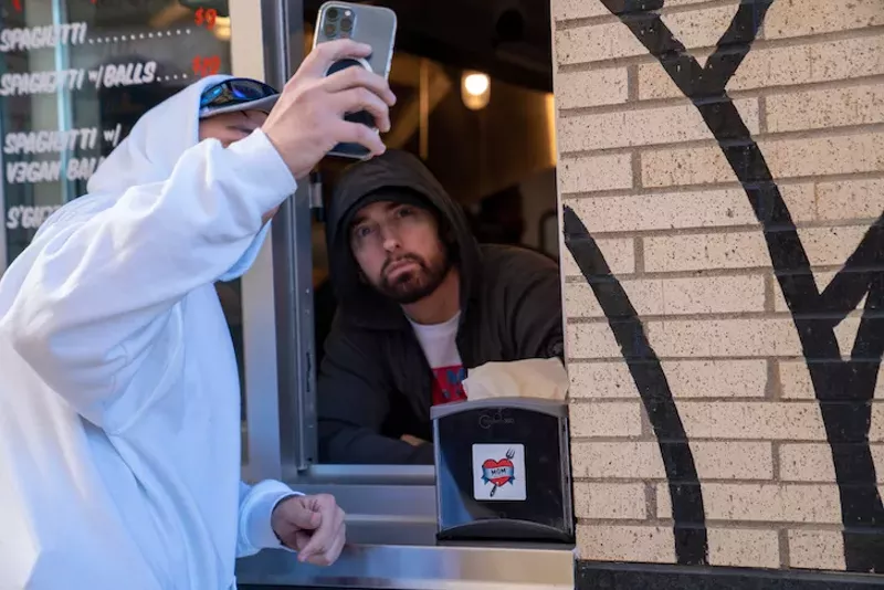 The real Slim Shady showed up to greet fans at his new Mom's Spaghetti restaurant in Detroit. - Joe Maroon