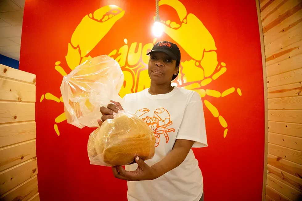 In the bag: Saucey Crab owner Angie Middleton has seafood boil restaurants in Detroit and Southfield. - Se7enFifteen