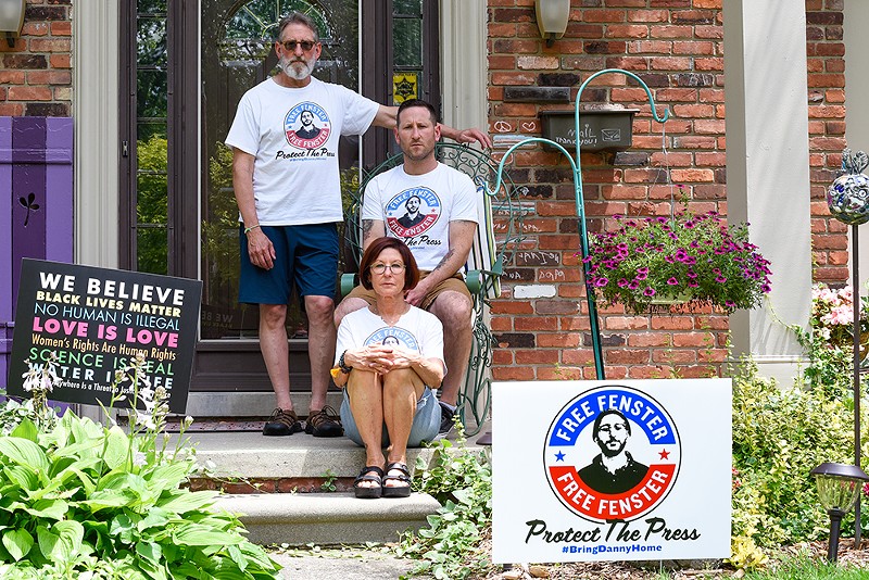 Journalist Danny Fenster’s family, clockwise from left: father Buddy, brother Bryan, and mother Rose, at their Huntington Woods home. - KELLEY O’NEILL