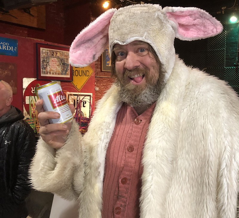 Jimmy Doom cracks open a cold one during a recent adult Easter egg hunt at the Old Miami. - Mickey Lyons