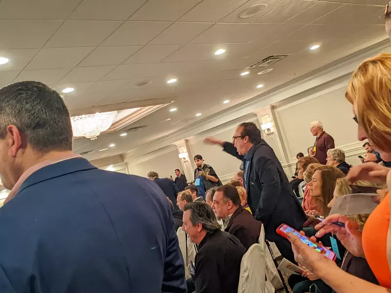 An unidentified Republican delegate objects during the Macomb County GOP nominating convention in Shelby Township, April 11, 2022 - Laina G. Stebbins / Michigan Advance