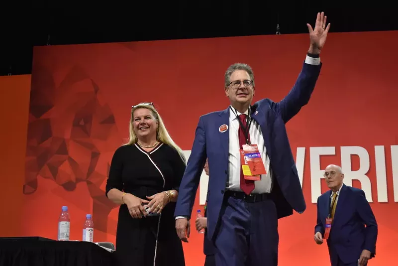 Michigan GOP Co-Chair Meshawn Maddock and AG nominee Matt DePerno at the Michigan Republican Party Endorsement Convention, April 23, 2022. - Allison R. Donahue, Michigan Advance