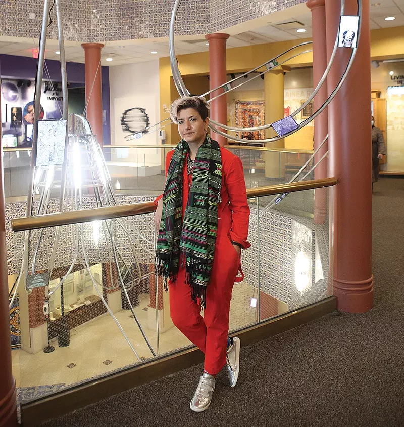 Resembling a cross between a spaceship and an octopus, “al-Falaq” has 35-foot tentacles that extend throughout the floors of the museum, outfitted with 81 computer screens. Ali describes it as a “museum within a museum.” - COURTESY OF THE ARAB AMERICAN NATIONAL MUSEUM