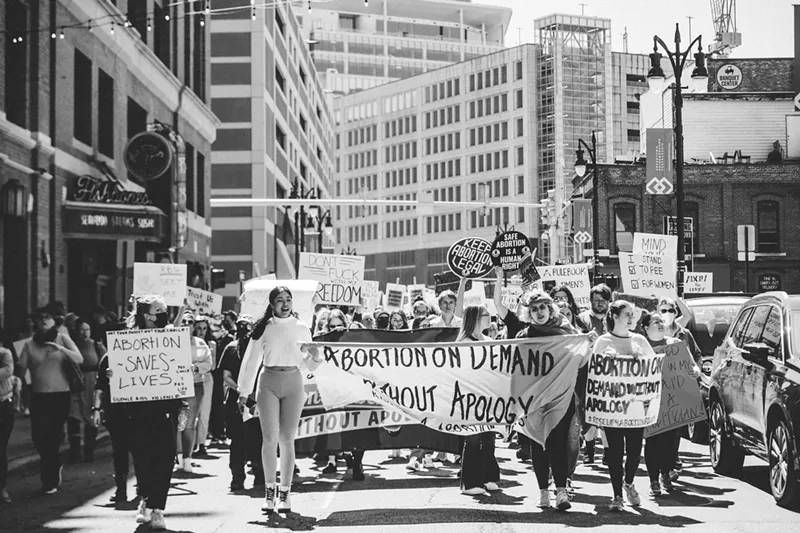 Michiganders outraged at the leaked Supreme Court memo take to the streets in downtown Detroit on Saturday. - Viola Klocko