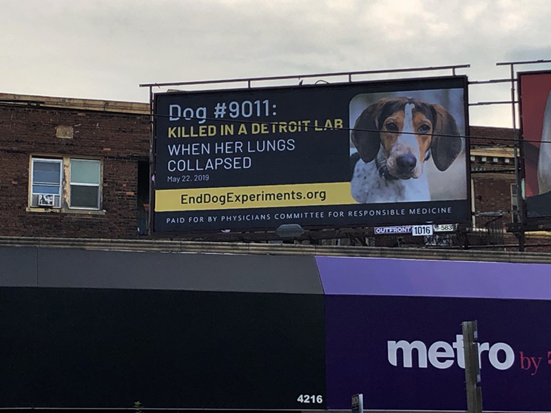 One of four billboards displayed in Detroit as part of a campaign calling on Wayne State University to end experiments on dogs. - STEVE NEAVLING