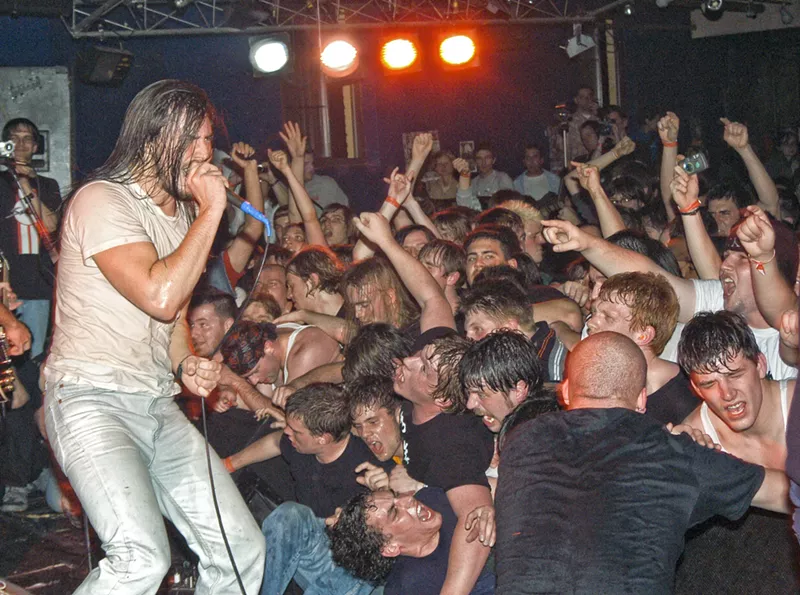 Andrew W.K., who grew up in Ann Arbor, performing at Detroit's Magic Stick. - Doug Coombe