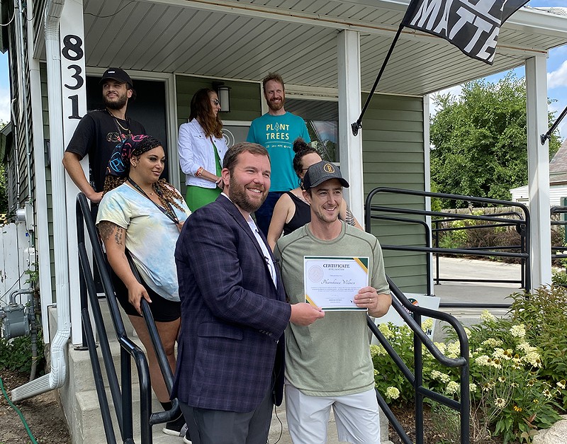 Cannabis Regulatory Agency executive director Andrew Brisbo awarded Grand Rapids dispensary owner Casey Kornoelje with the state's first Social Equity All-Star Program “gold” award. - Courtesy photo