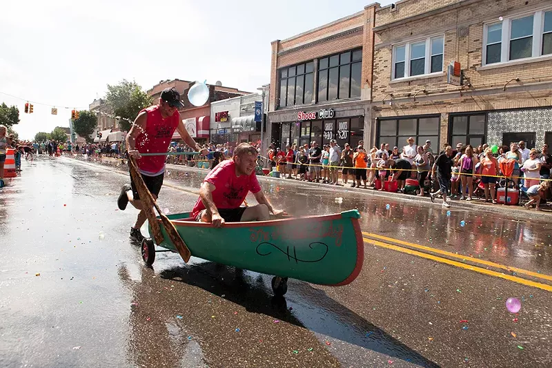 The Hamtramck Yacht Club Canoe Race sees onlookers pelt wheel-driven “canoes” with water balloons. - Konrad Maziarz