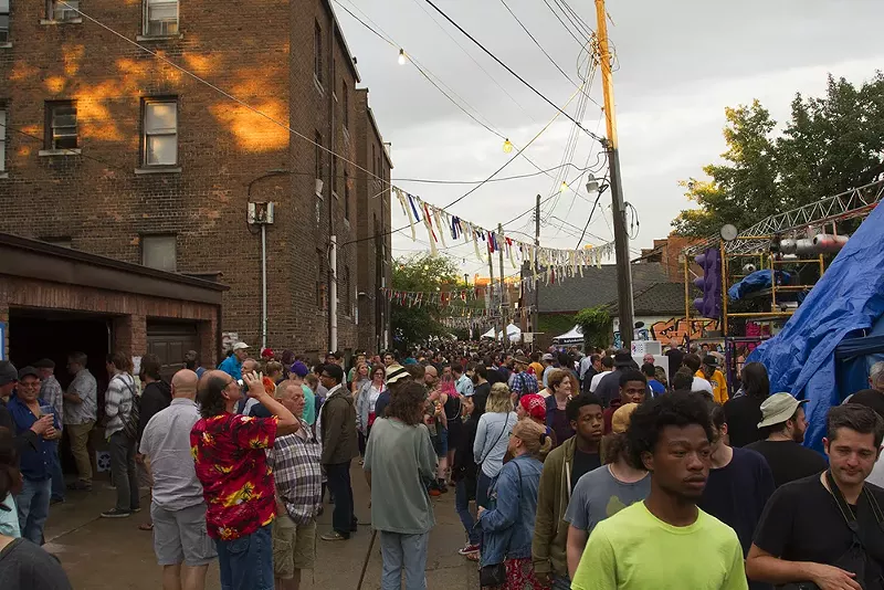 Revelers Dallying the in Alley. - Steve Neavling