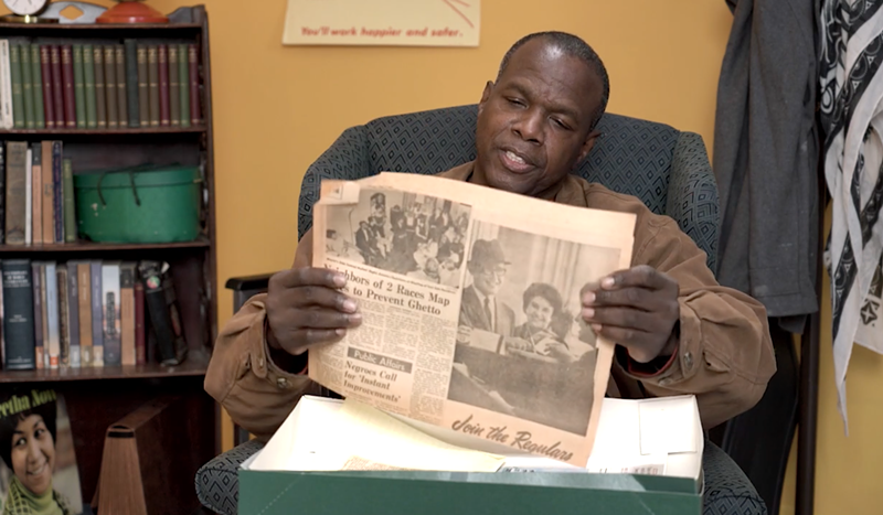 Sarah E. Ray’s great grand nephew Kourtney Thompson looks at a newspaper clipping about Action House from 1968. - Screenshot