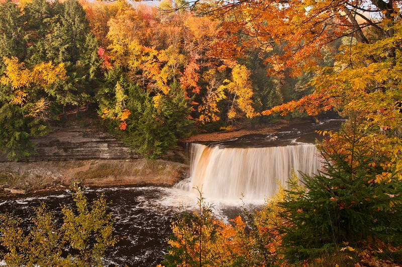 The upper Tahquamenon Falls in all its autumn glory. - Neil Weaver Photography/ Shutterstock