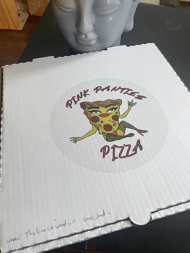 A Pink Panties Pizza box with a handwritten note reading, “warning, this pizza got weed in it… good weed...” - Randiah Camille Green