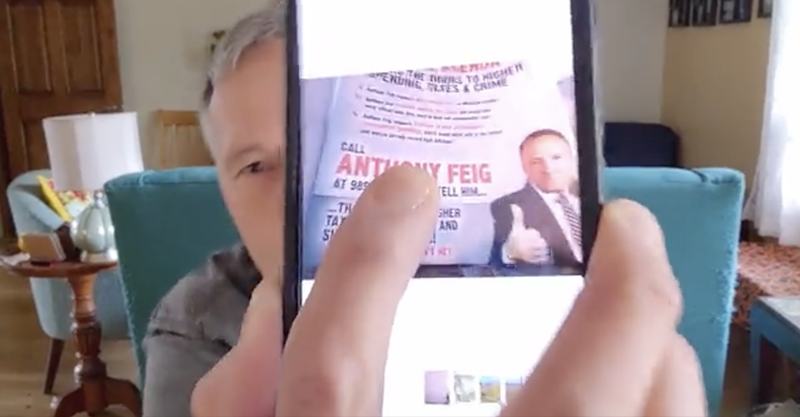 Anthony Feig, a Democrat running for state House, shows a political ad from his opponents that featured his cellphone number. - Twitter, @AnthonyFeig
