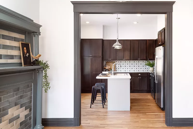 The Murray features exposed brick and blue and green colorways blended between floors. - Brett Mountain, courtesy of Concetti