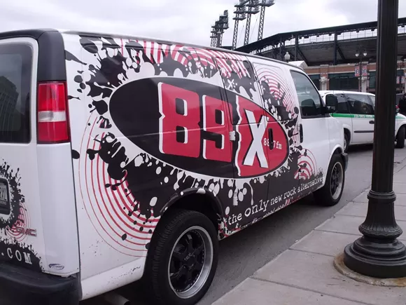 An 89X van at Comerica Park. - Photo by Lauren (via Flickr)