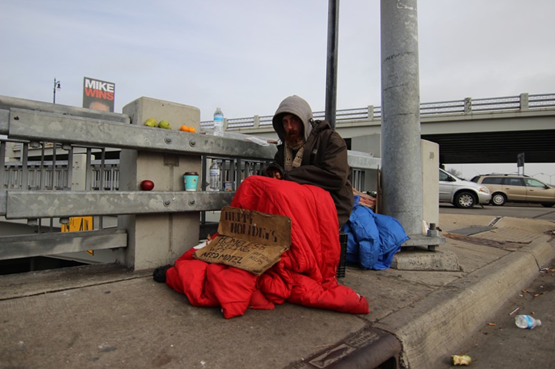 A man on Eight Mile Road in Detroit experiencing homelessness. - sharghzadeh, Flickr Creative Commons