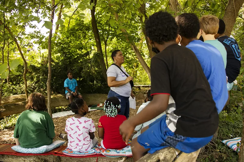 Detroit poet Jassmine Parks leads a poetry workshop in Circle Forest. - Garrett MacLean/ Courtesy photo