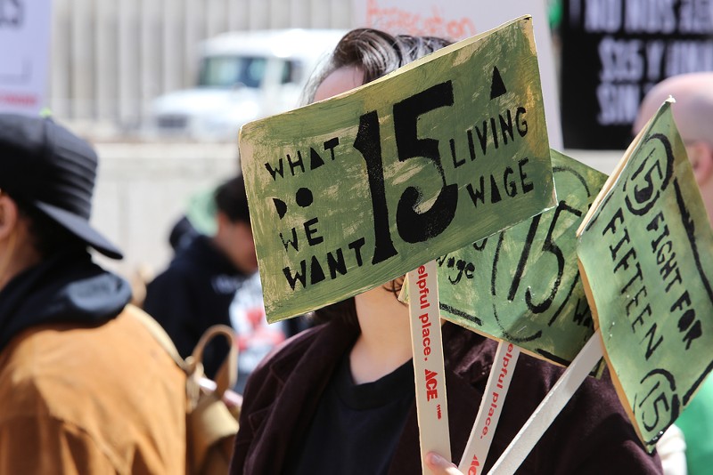 Protesters have demanded a living wage of $15 an hour nationwide. - Shutterstock