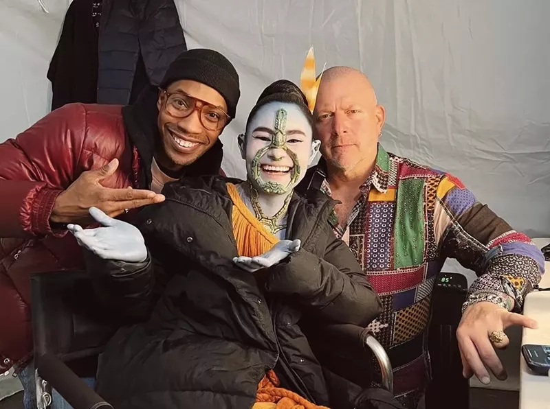 AJ Crimson (left) worked on the makeup for Namora, played by actress Mabel Cadena (center) in Black Panther: Wakanda Forever. - Courtesy of Rochelle Jackson