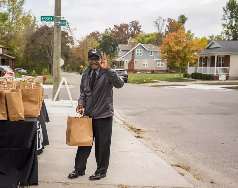 The boxes include fresh produce and dry pantry staples, recipe cards, and information on receiving public assistance for things like food, heating, and housing. - Courtesy of Raphael Wright