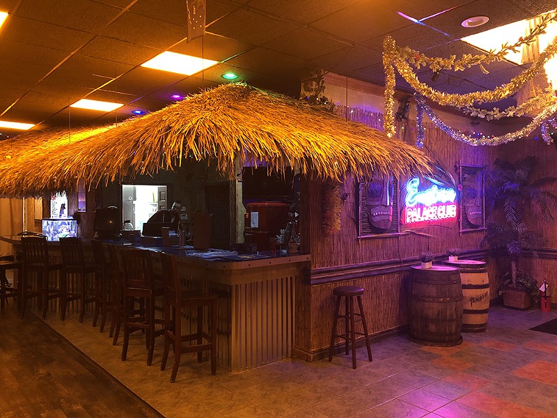 Hazel Park’s Eastern Palace Club has been reimagined as a beach-themed bar with thatched roof canopies. - Lee DeVito
