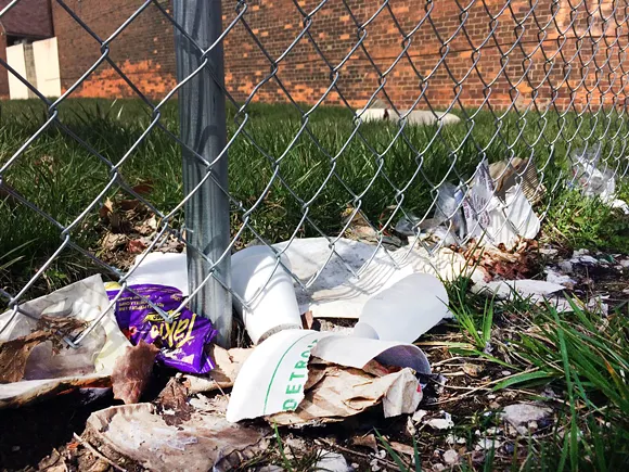 Trash along one of Henry Velleman's fences pictured earlier this week. - Photo by Tom Perkins