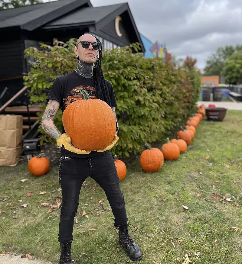 Kevin McLeod standing outside Witch House Tattoo. Naturally, the studio opened to the public in October. - Courtesy photo