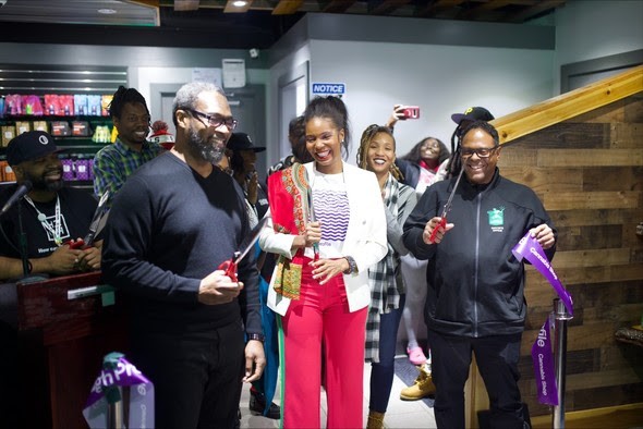 The grand opening of High Profile Detroit included Council President Pro Tem James Tate (left) and co-owner Najanava Harvey-Quinn (center). - City of Detroit